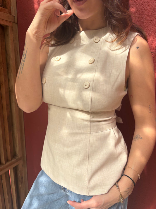 Top à boutons sans manches