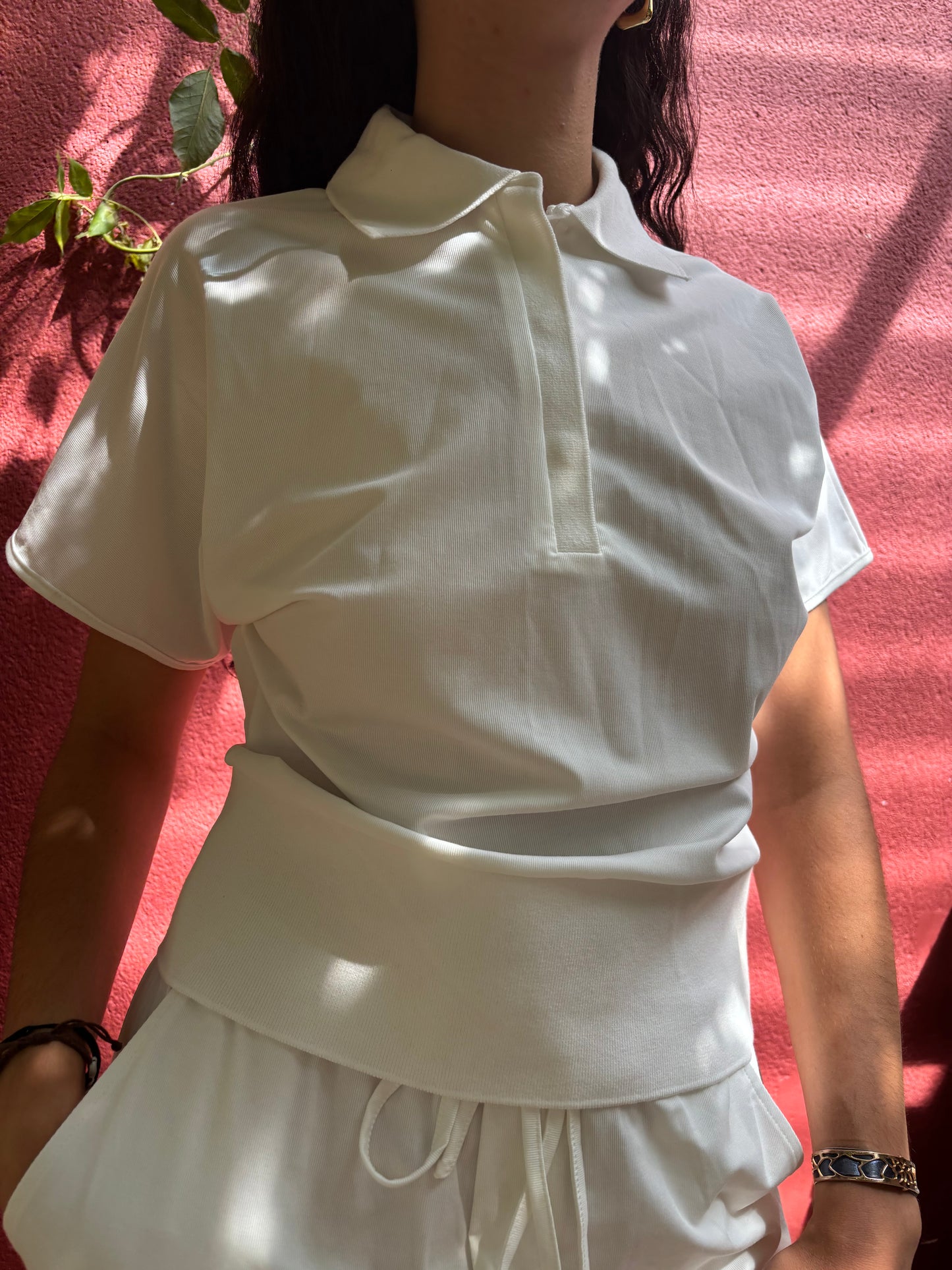 Polo taille resserrée